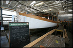 Rénovation d'un bateau moteur en bois